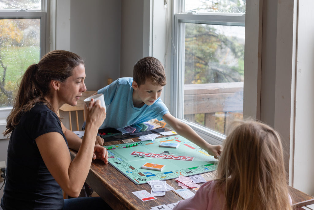 Spending a rainy day playing board games with the kids.