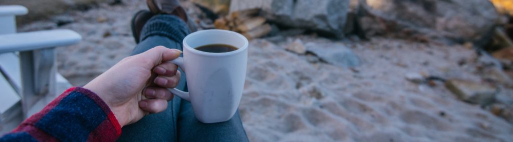 Enjoying a cup of coffee (in a regular mug!) early morning at one of our ocean front cottages.