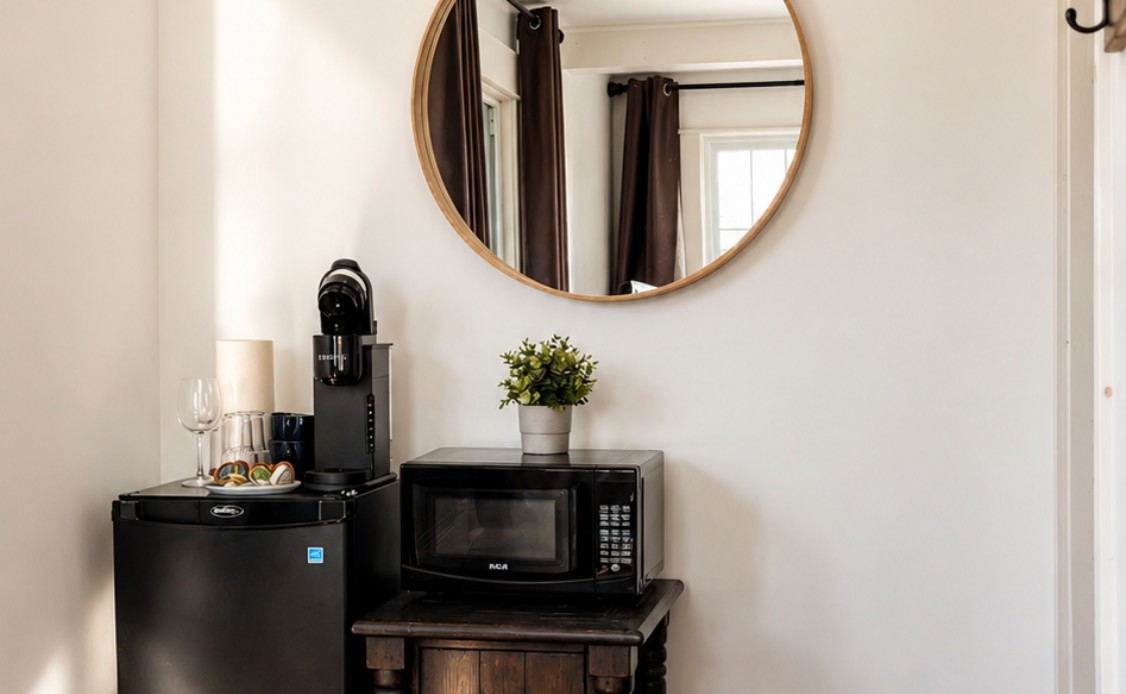 16 A cozy kitchenette at Oceanstone Resort with snacks, coffee, soft lighting, and calming decor reflecting a serene, relaxing vibe.